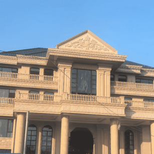 三亚黄金麻别墅外墙干挂石材效果示例