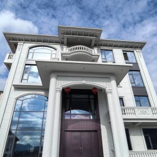 三亚白麻别墅外墙干挂石材效果示例