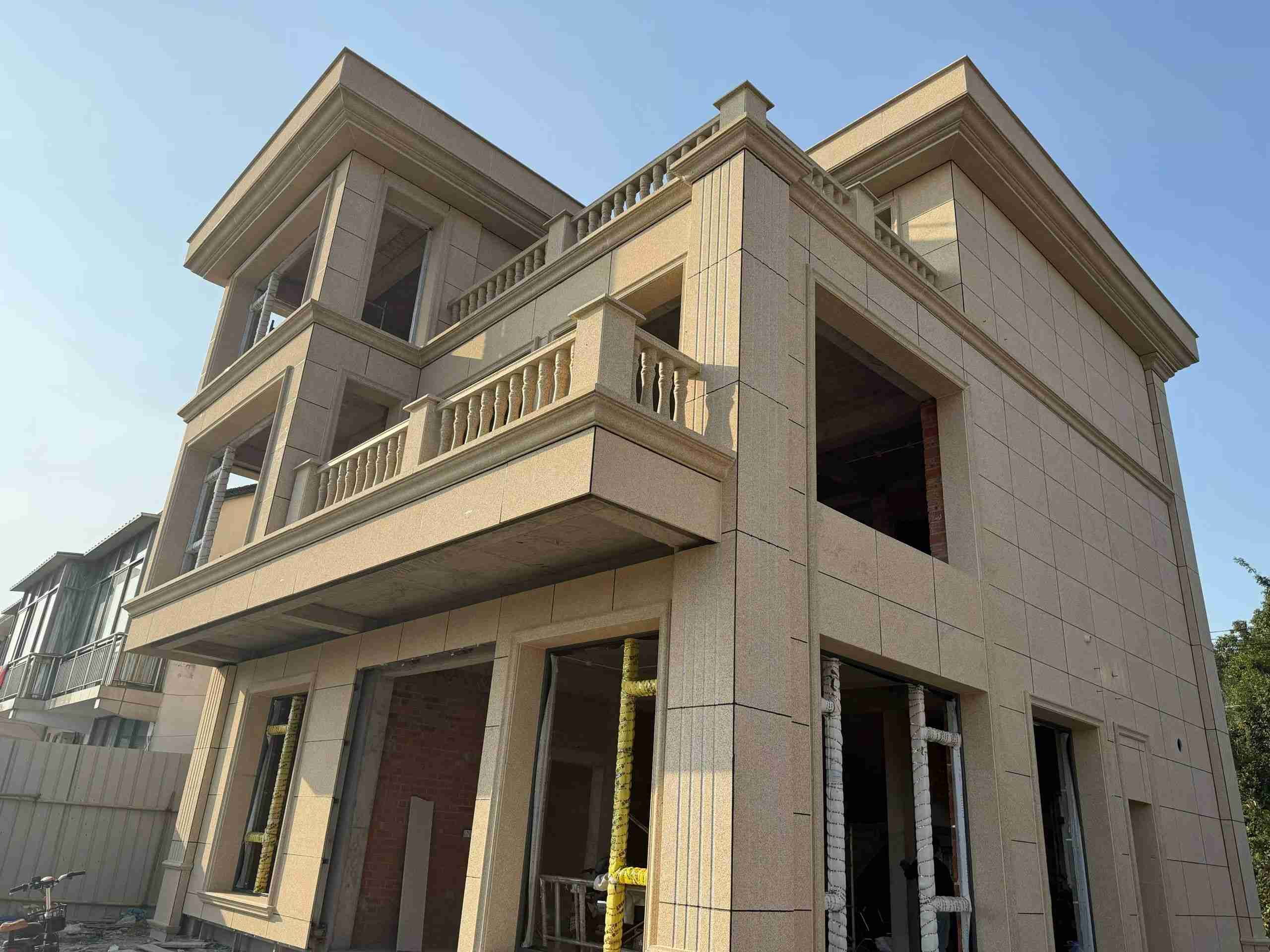 三亚 黄金麻花岗岩石材荔枝面外墙干挂效果展示